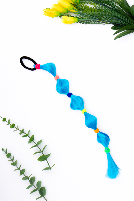 Коси зі штучного волосся на гумках